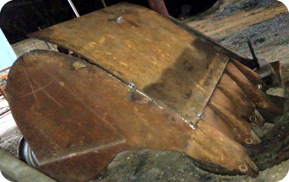 Excavator bucket repair and rebuild